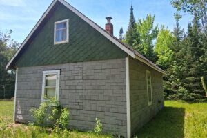 Wooded land with 2-BR cabin for sale on Somo River near Tomahawk, WI